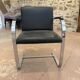 Pair of Executive Chairs by Knoll attributed to Charles Pollock in black leather.