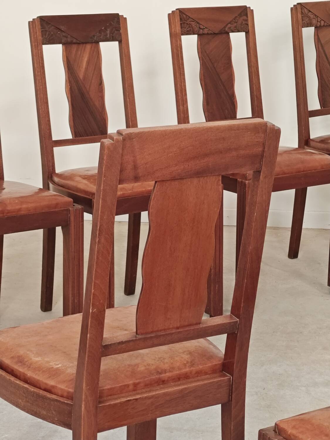 Set of 6 Art Deco chairs in Oak and Walnut with camel leather.