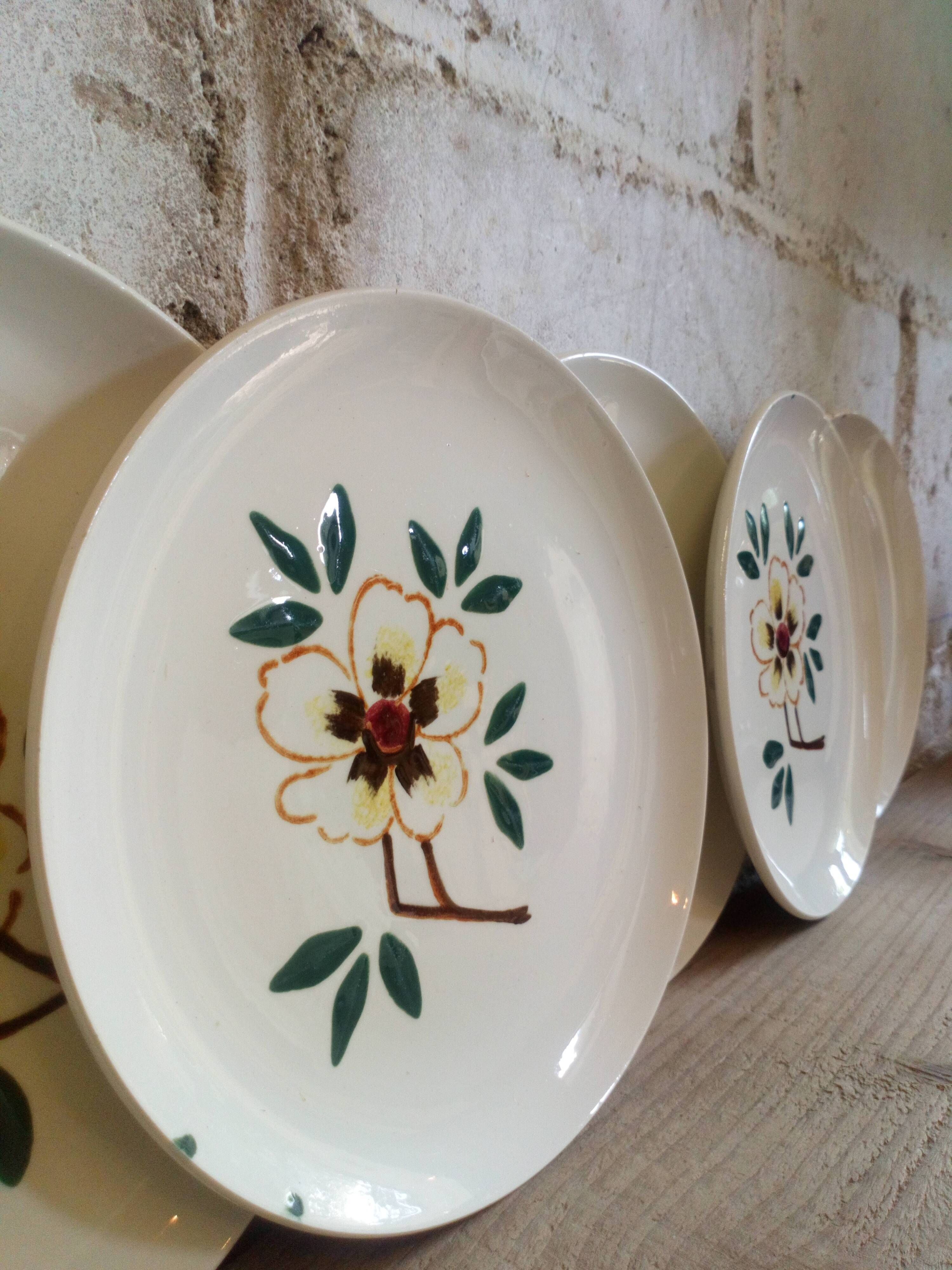 Five flowery dessert plates from continental earthenware