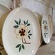 Five flowery dessert plates from continental earthenware