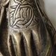 Door knocker in bronze