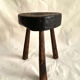 Brutalist tipode stool in carved wood