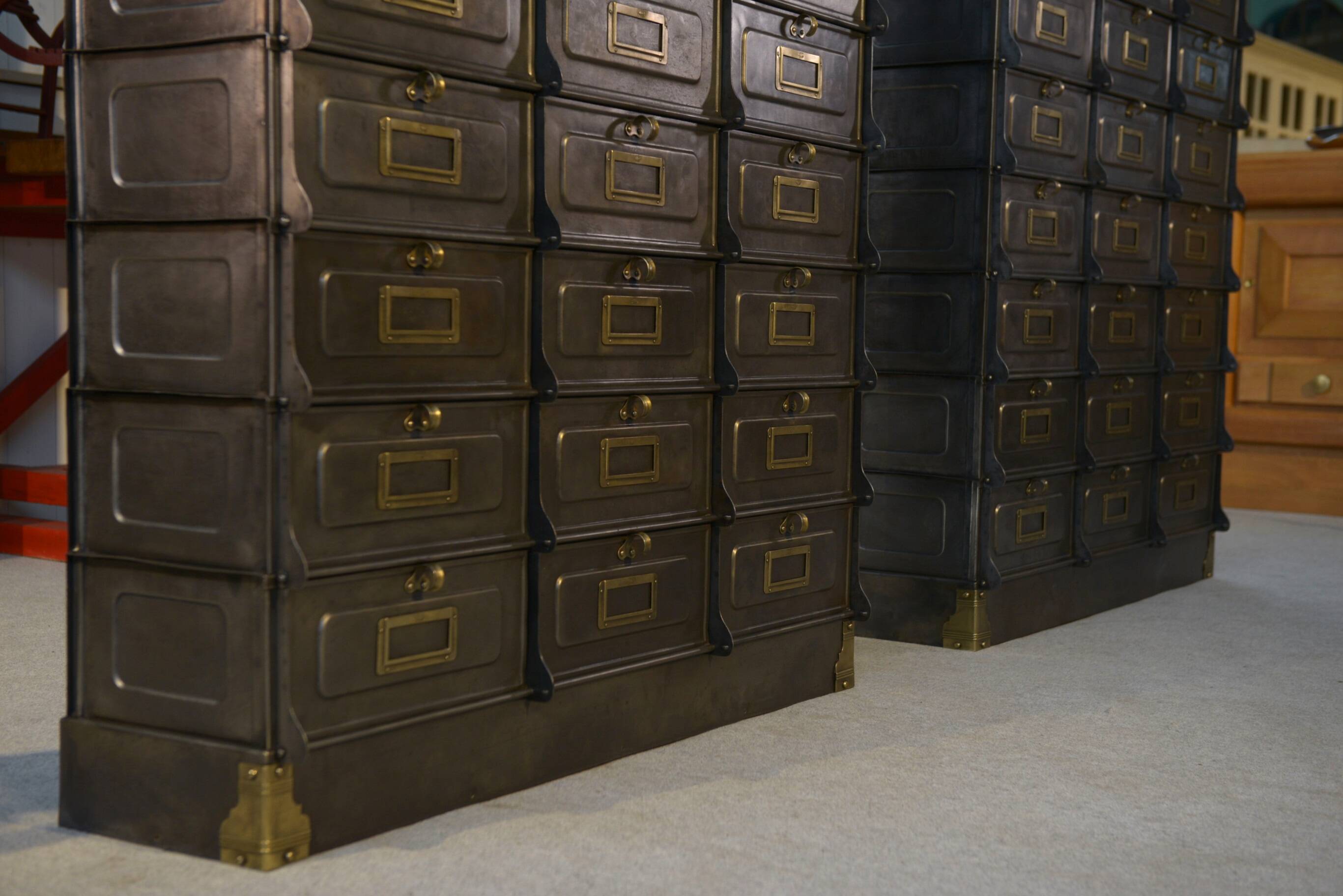 Pair of STRAFOR French cabinets with flaps, circa 1920s