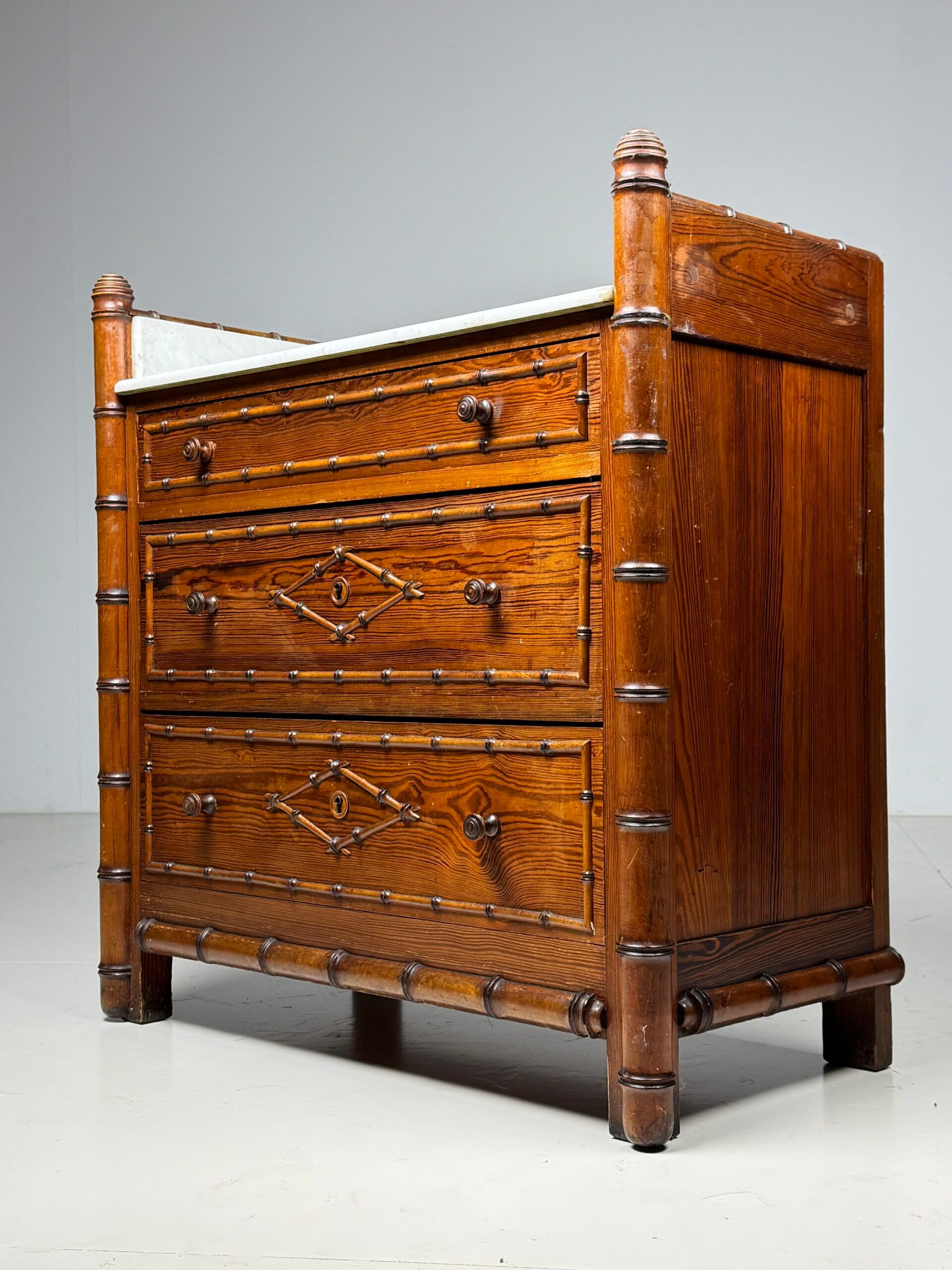 Faux bamboo chest of drawers 1900