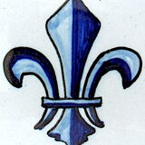 White-blue earthenware plate centered on a lily flower