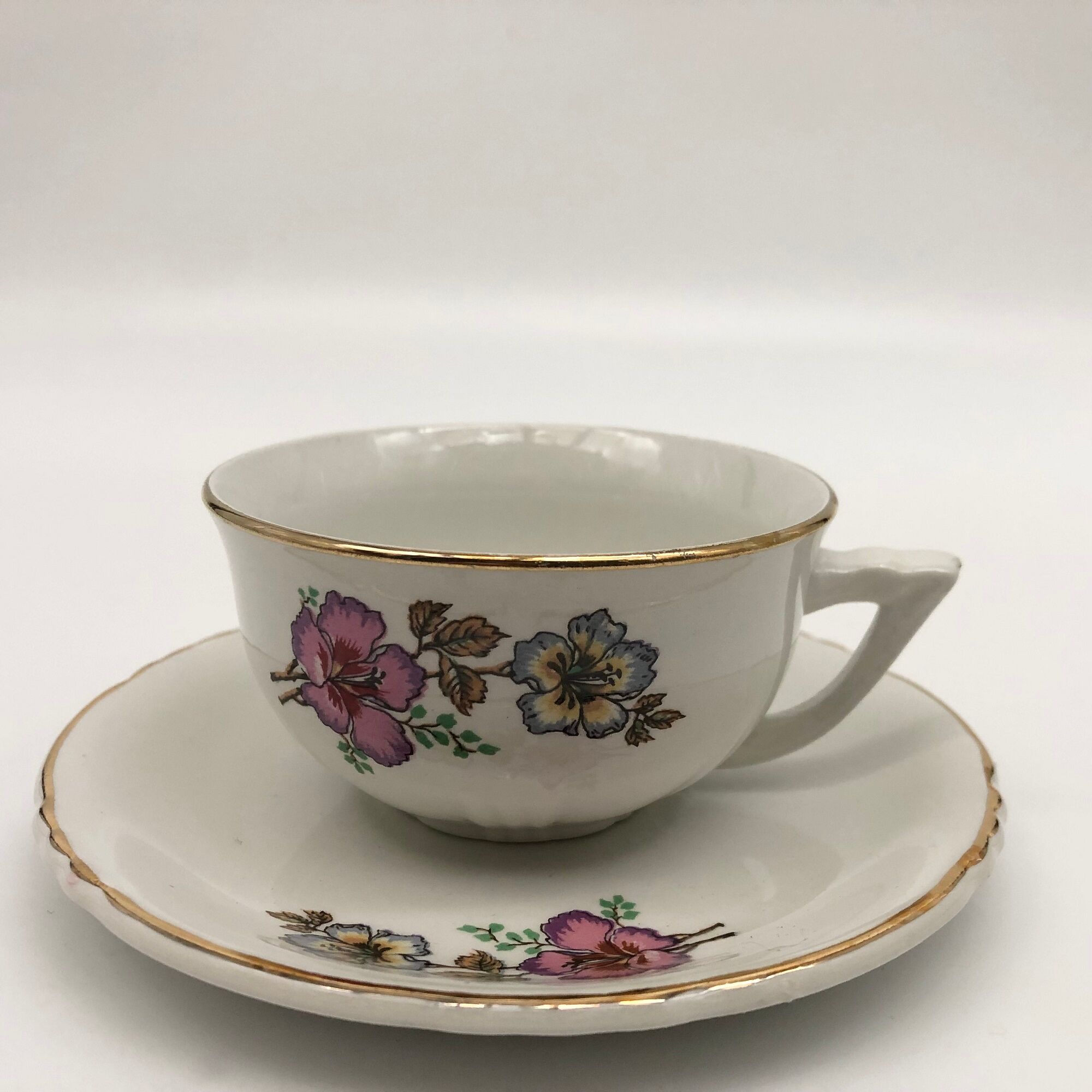 Coffee service 6 cups with saucers, sugar bowl and creamer.