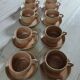 8 tasses anciennes avec soucoupes en grès