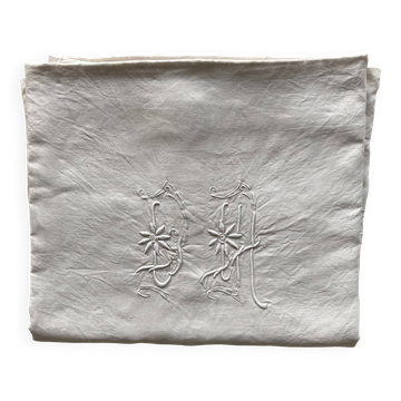 Sublime linen sheet with lace, embroidery, and monogram.