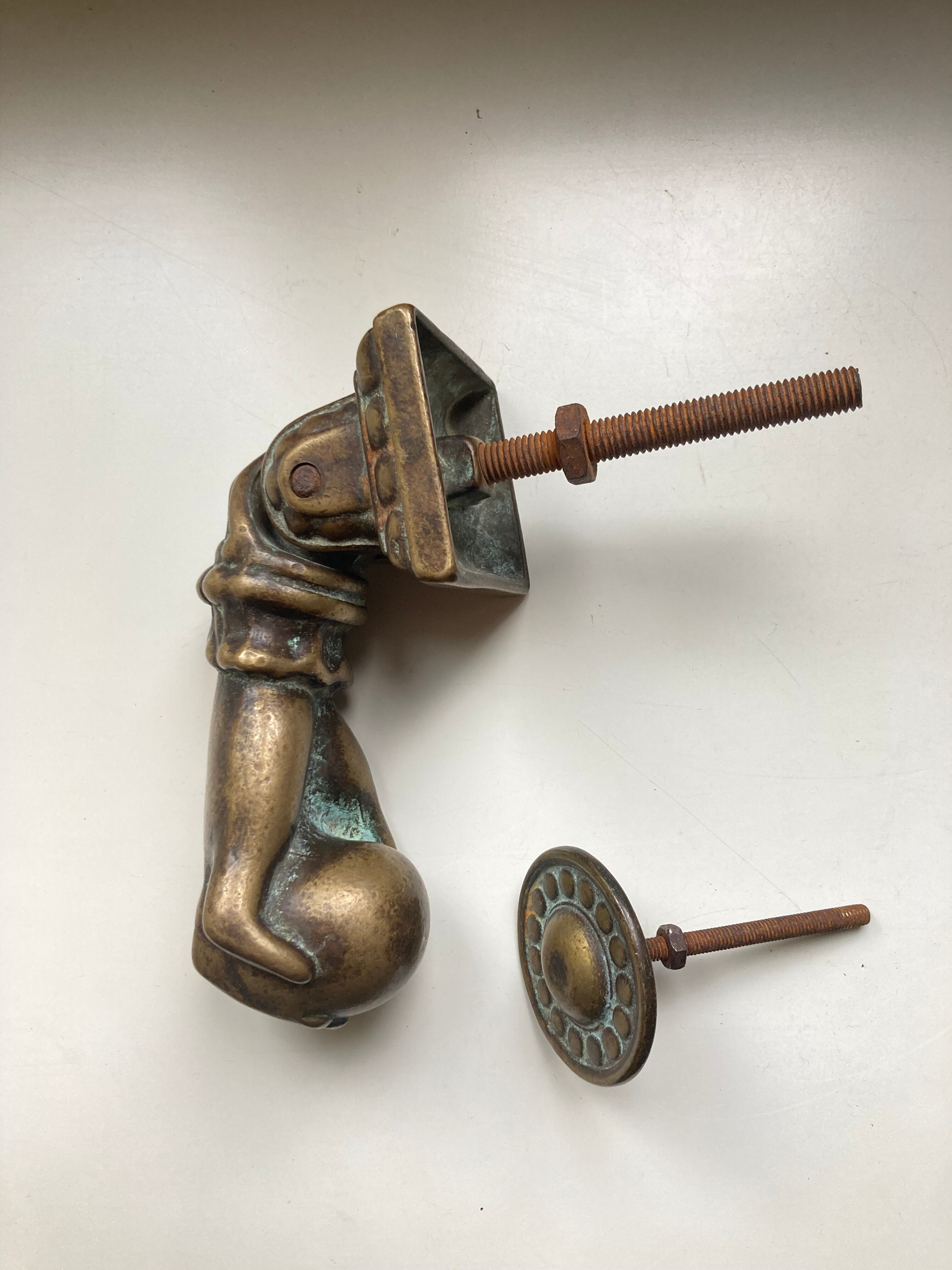 Antique bronze hand-shaped door knocker