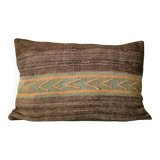 Cushion cover in old Berber blanket.