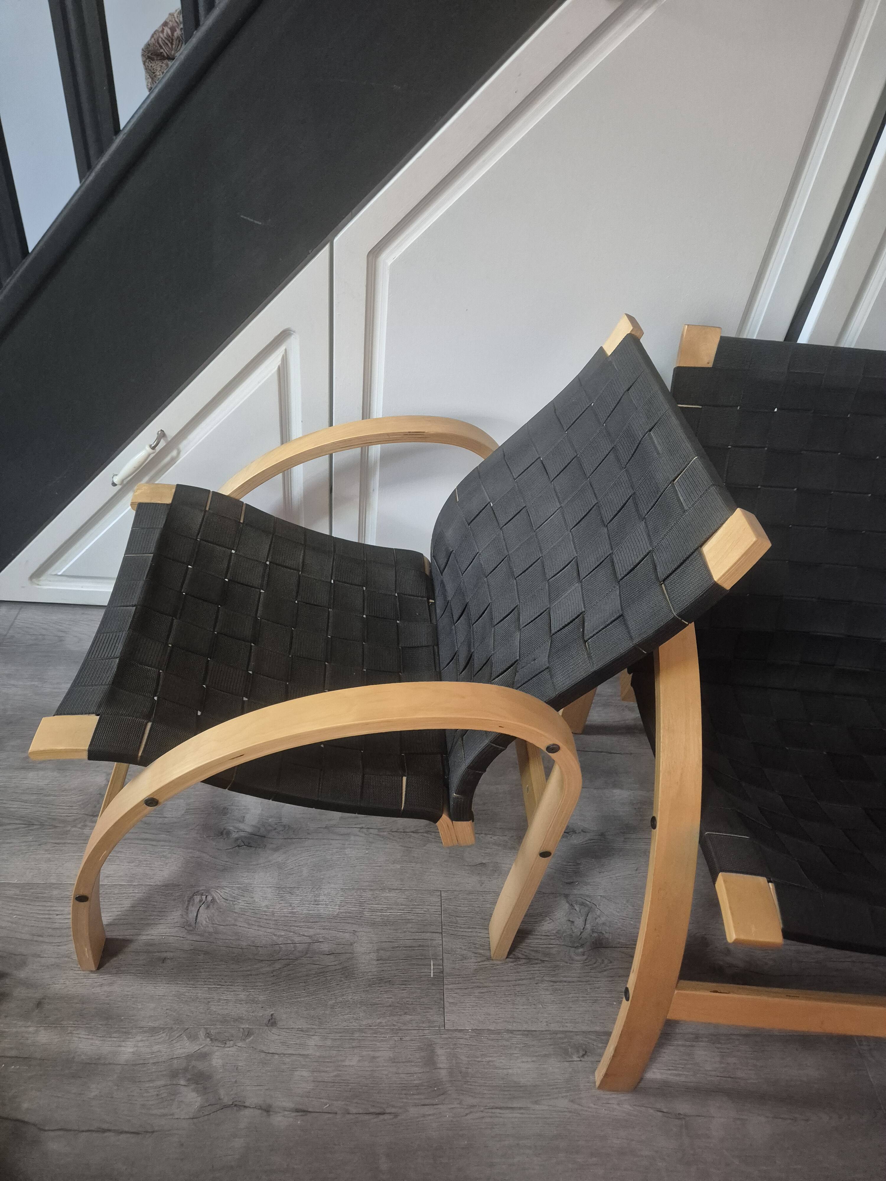 pair set of 2 armchairs with a wooden frame and black fabric weaving