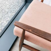 Scandinavian armchair in light coral knitted velvet