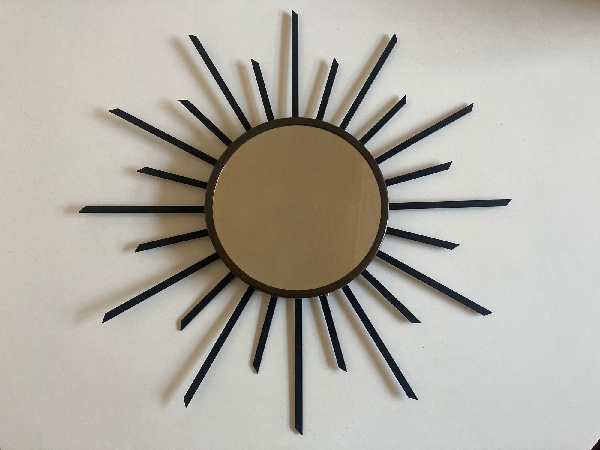 Sun mirror 1960 in patinated brass and black rays 50cm