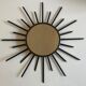 Sun mirror 1960 in patinated brass and black rays 50cm