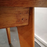 Dining table with compass feet