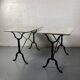 Set of two bistro tables in marble and wrought iron