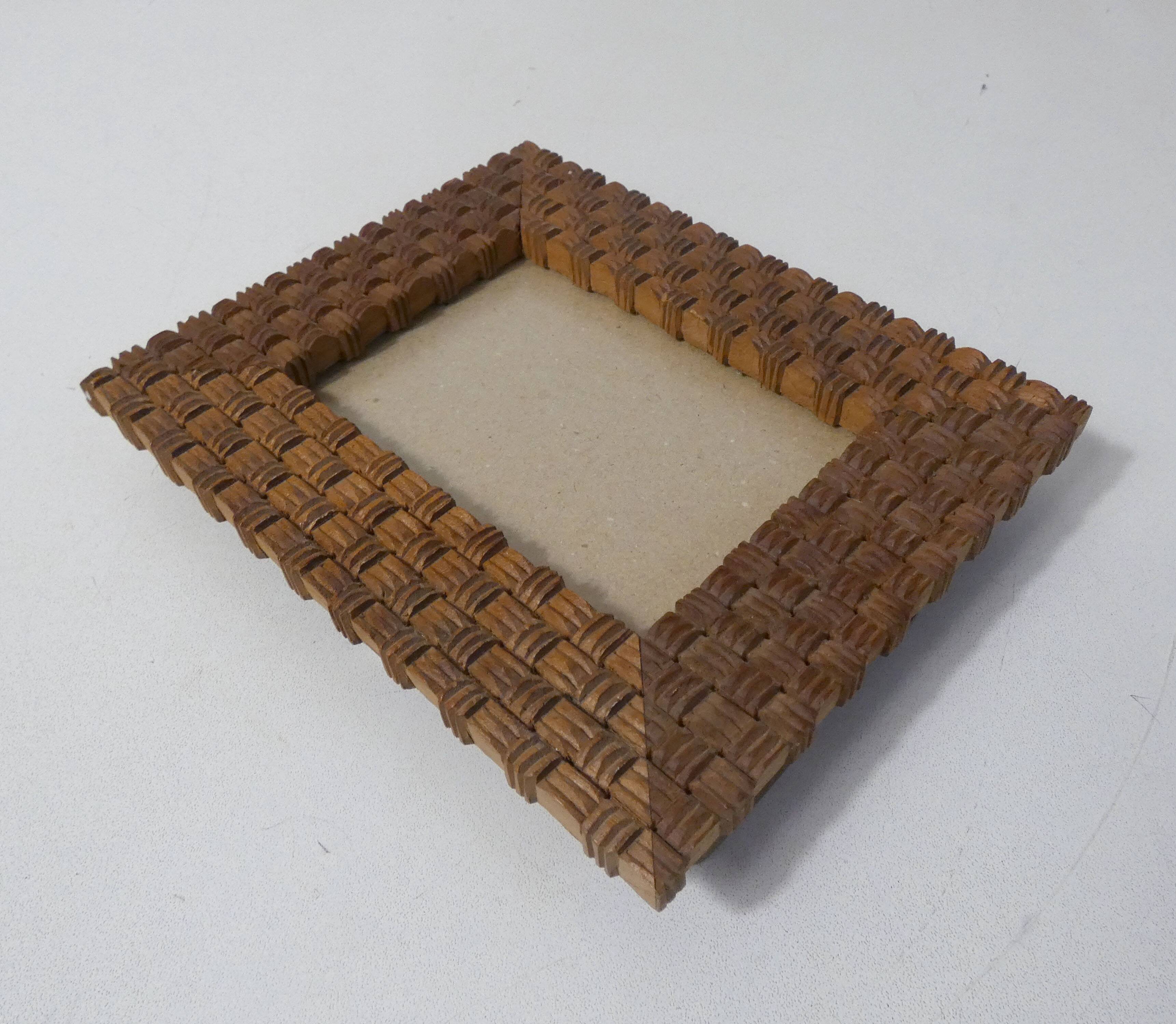 Cadre photo en bois sculpté