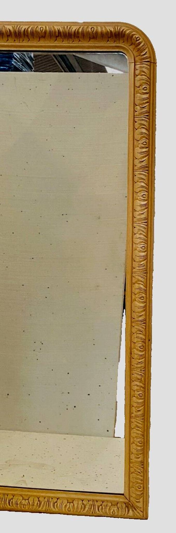 Louis Philippe mirror in wood and patinated stucco, 19th century.