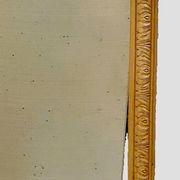 Louis Philippe mirror in wood and patinated stucco, 19th century.