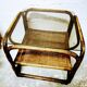 Side table in rattan and smoked glass