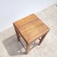 Tabouret ancien en bois foncé patiné