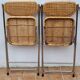 Pair of vintage metal and cane folding chairs