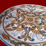Grand plat rond en faience d'ibiza.