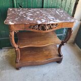 Carved walnut console marble top of the nineteenth century