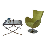 Bucket seat in chrome and green.