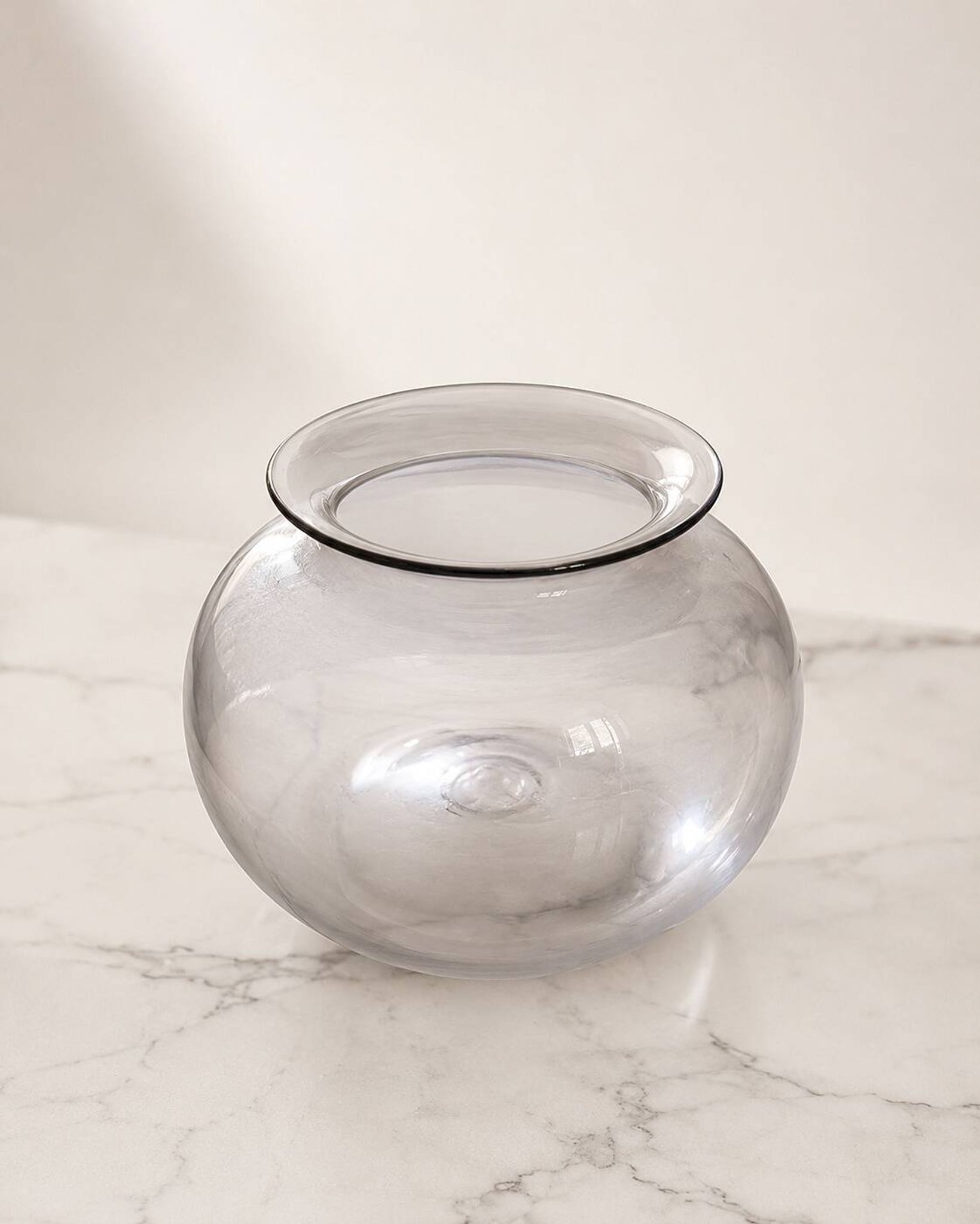Round vase in Greco-Roman style in smoked glass