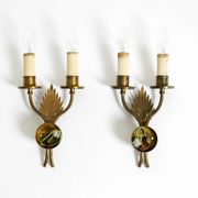 A pair of mid-century modern brass wall lamps by Vereinigte Werkstätten