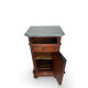 A pair of antique walnut bedside tables from the 1890s.
