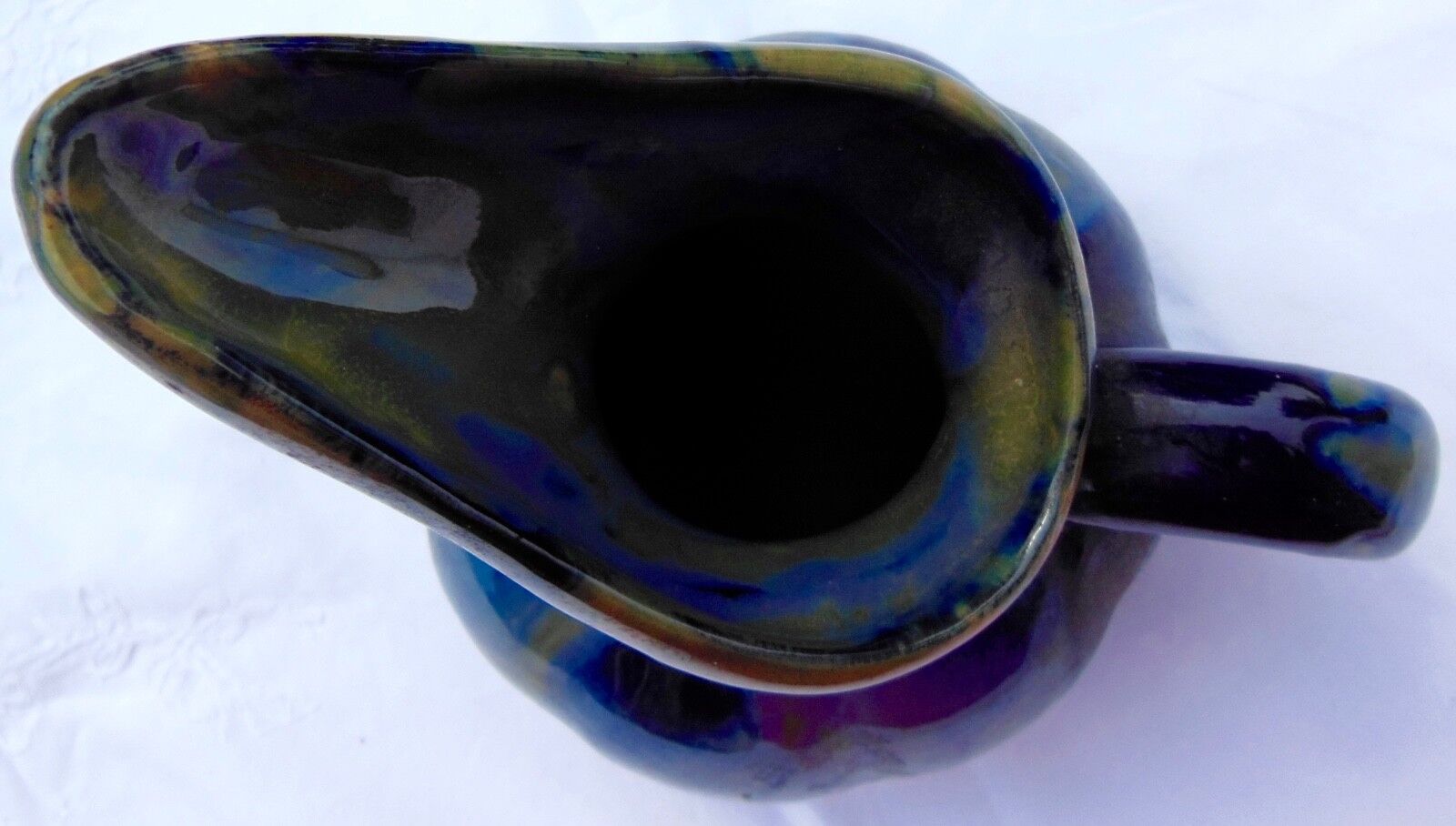 Enamelled ceramic pitcher - artist to identify