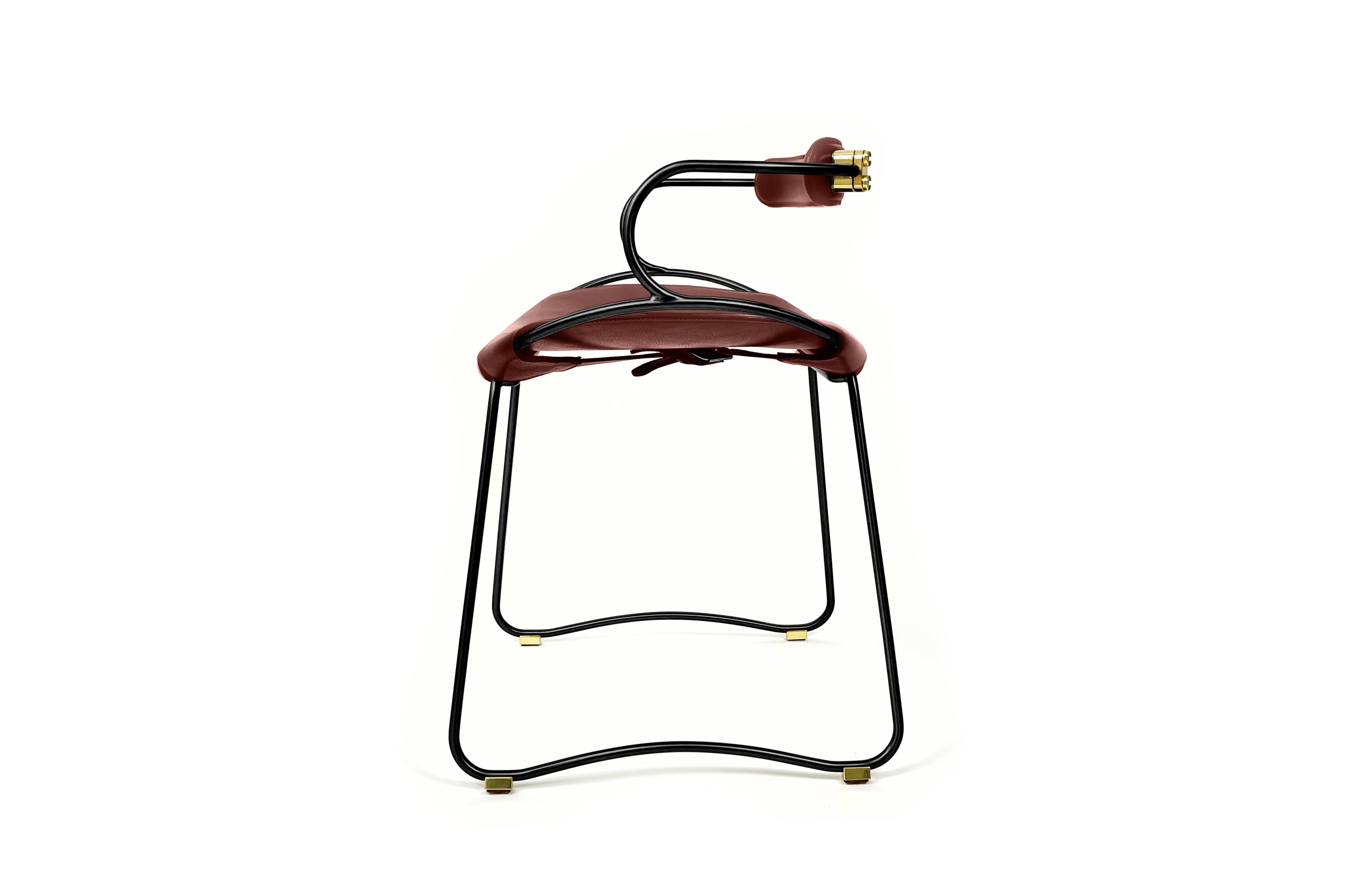 Kitchen bar stool with a smoked black metal backrest and cognac leather.