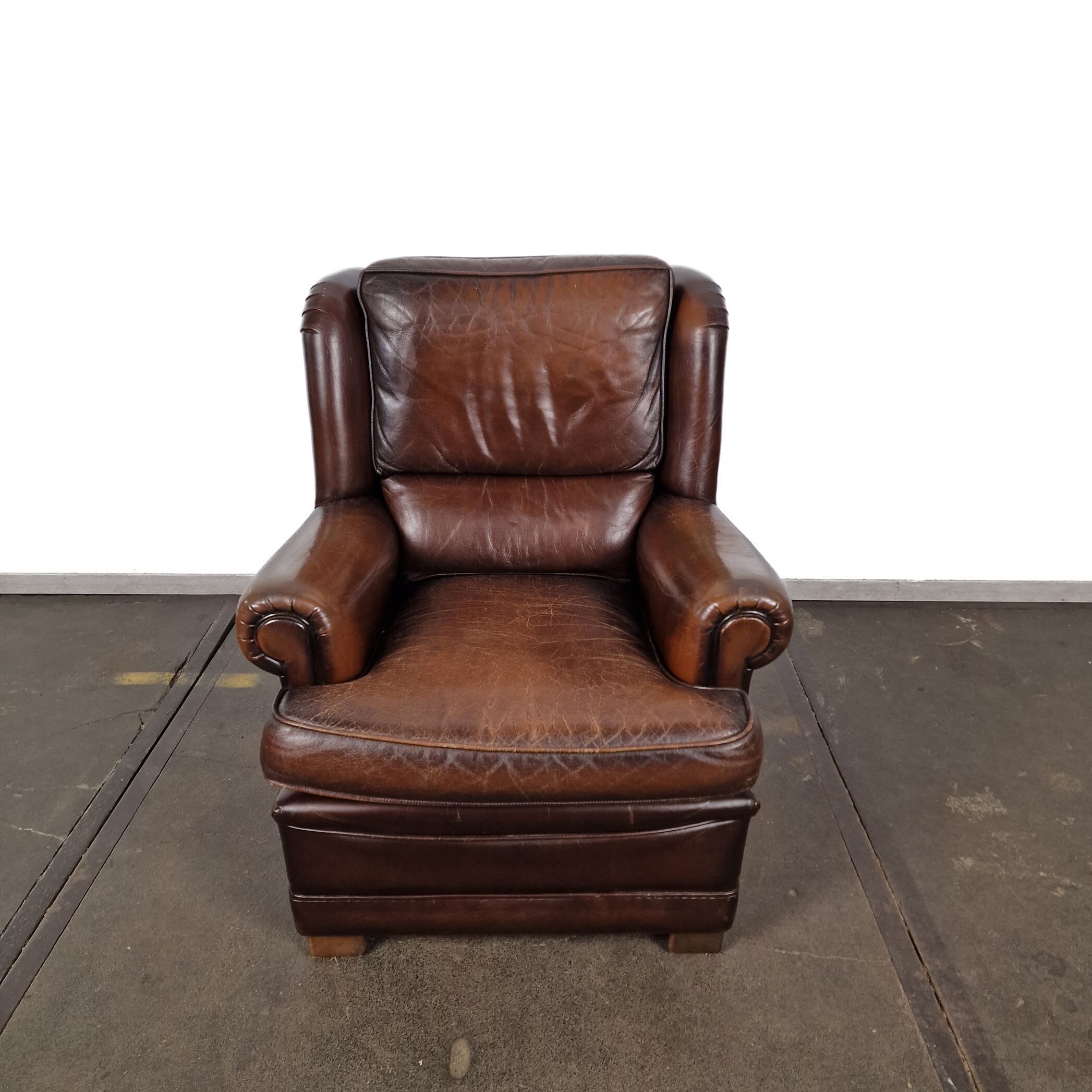 Vintage brown leather armchair