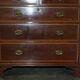 Antique Sheraton style commode by F. Thomas in hardwood and satinwood.
