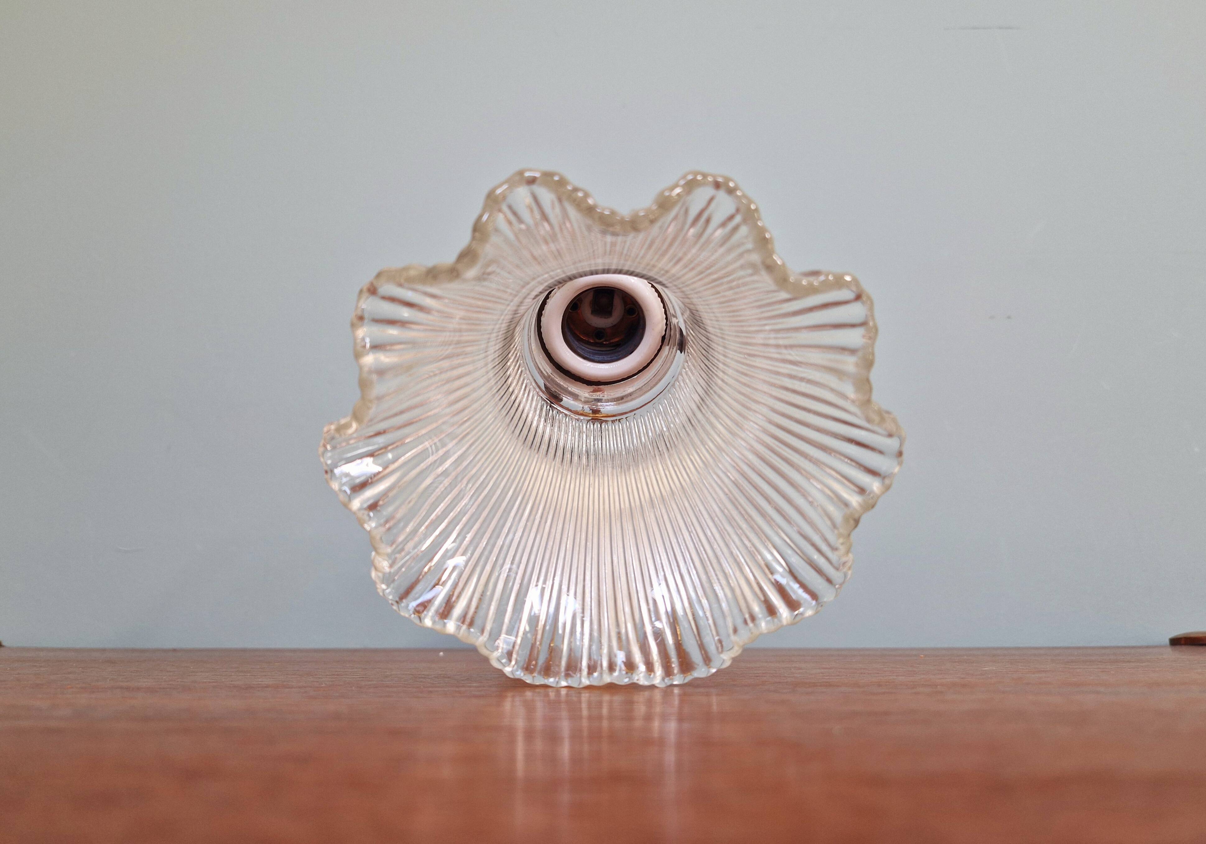 Bronze wall light with grooved clear glass, early 20th century