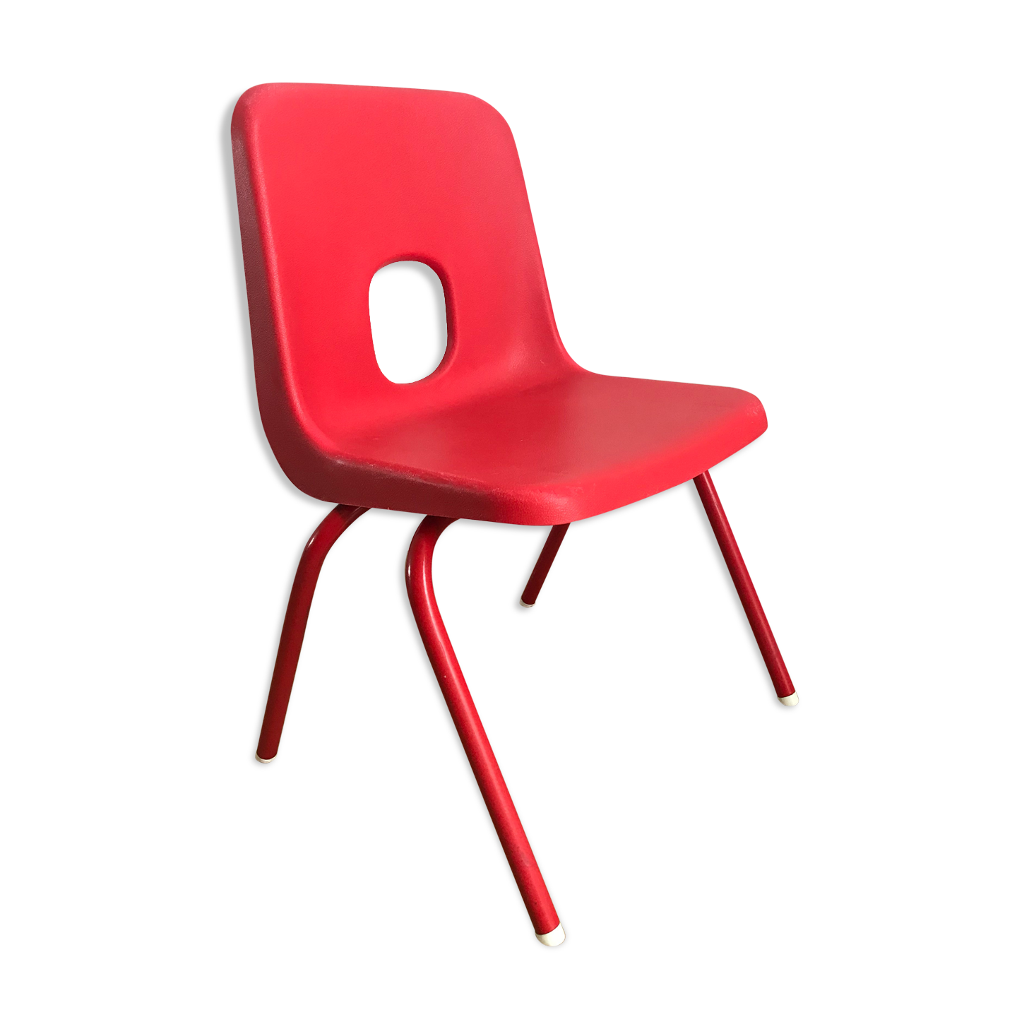 Red child chair by robin day for ikea