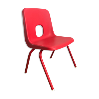 Red child chair by robin day for ikea