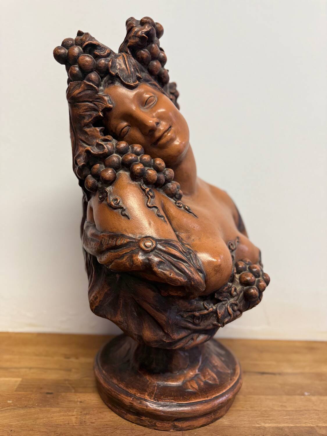 Terracotta sculpture Bust of Bacchus Grapes and vines in the style of