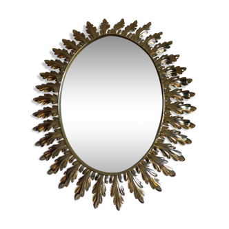 Miroir vintage de forme ovale en laiton doré à feuillages