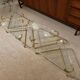 Coffee table and its 4 associated nesting tables in plexiglass and gold metal