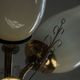 Paavo Tynell for Idman Oy, three-branch chandelier in brass and glass, mid-century, 1940s.