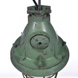 Industrial caged green lamp