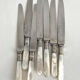 Antique table knives in mother-of-pearl and silver-plated metal