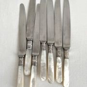 Antique table knives in mother-of-pearl and silver-plated metal