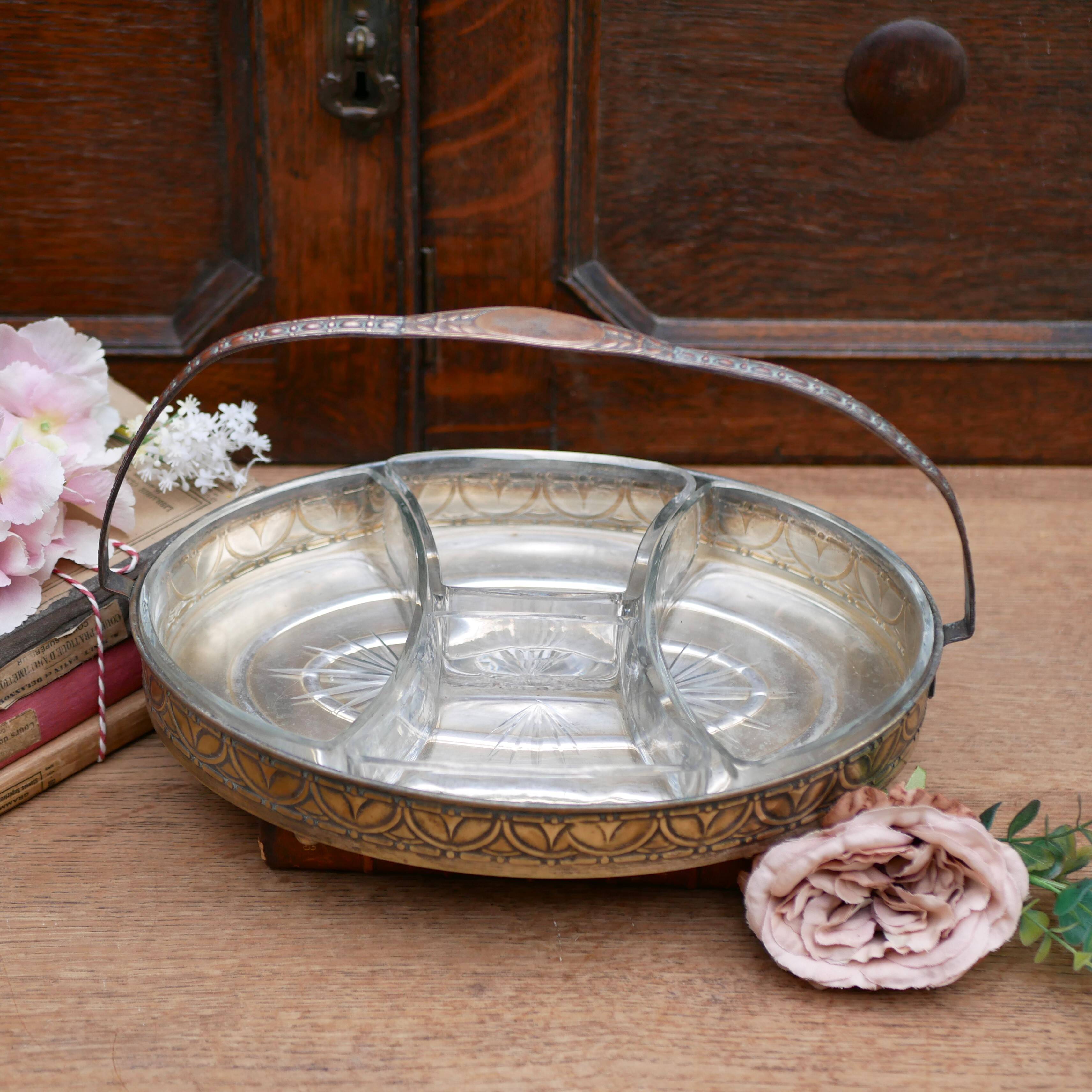 Art Nouveau serving dish plated in copper with removable glass inserts.