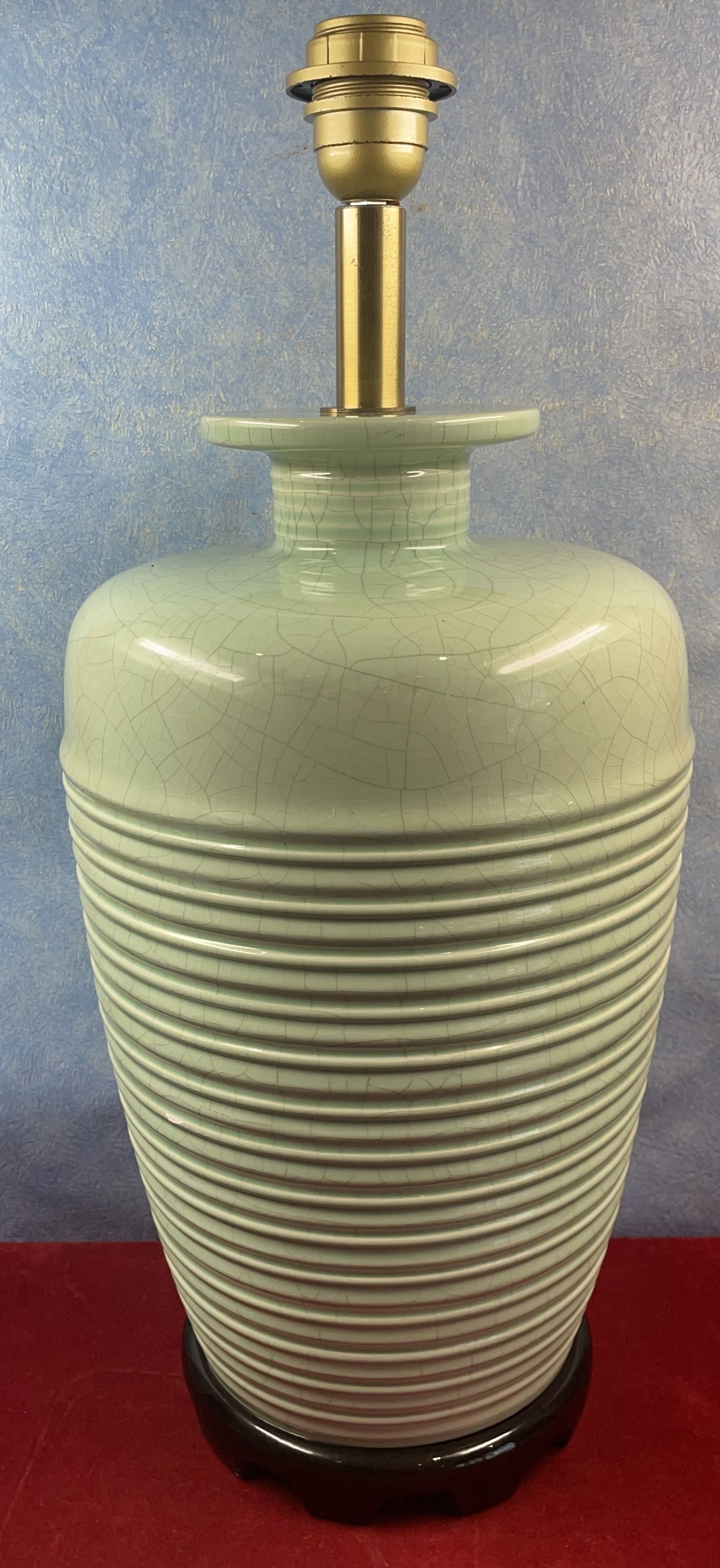 Contemporary ceramic lamp foot in green celadon color to electrify