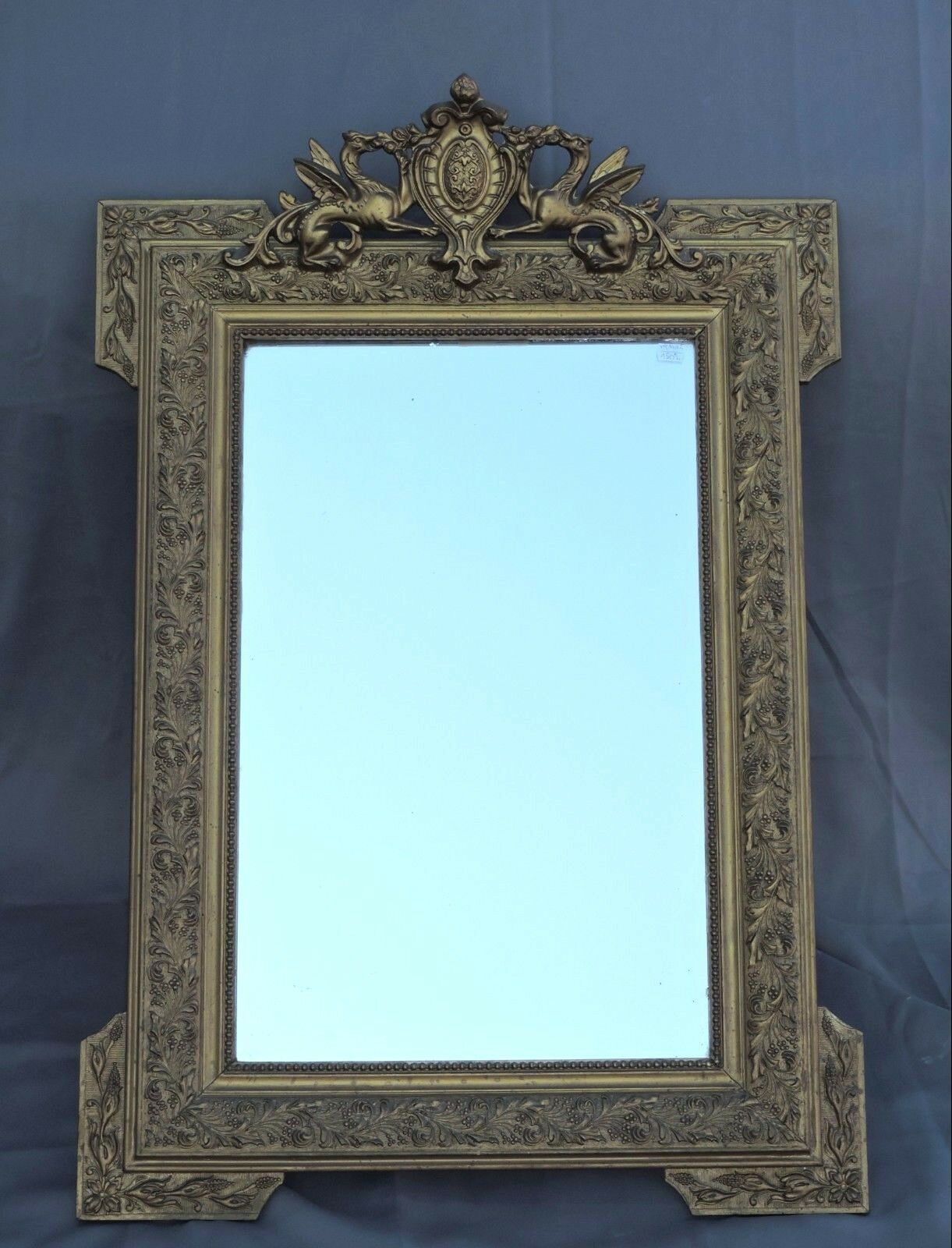 Glass or golden mirror of old fireplace 67x100cm pediment with chimeras