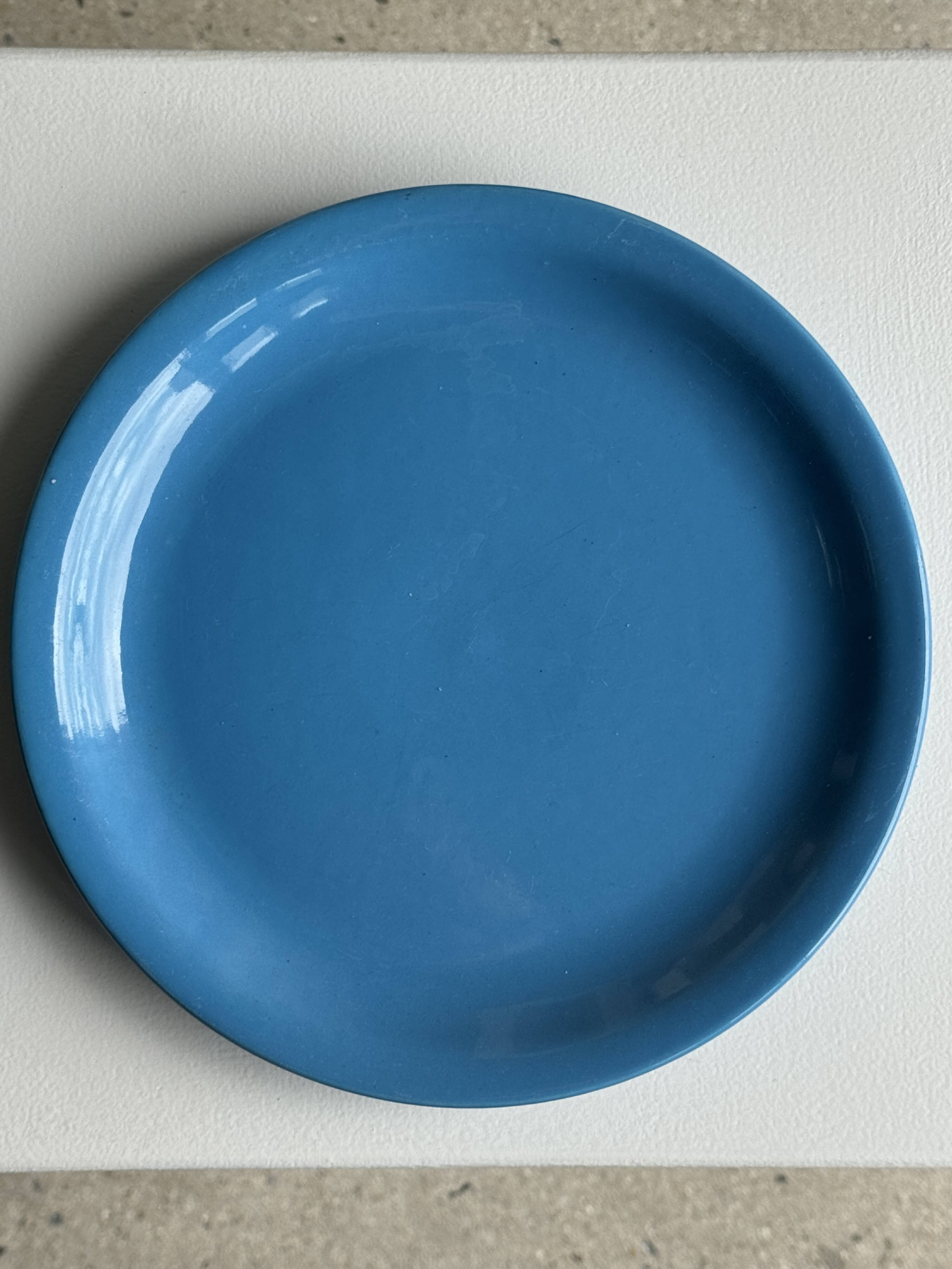Set of 2 sky blue plates, one slotted
